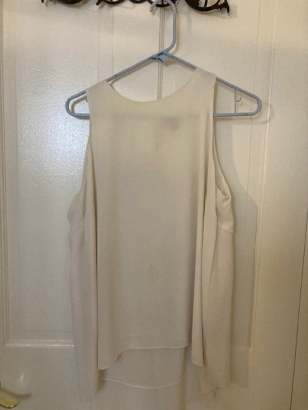 White flowy top